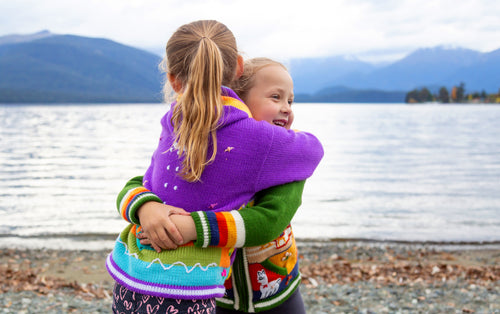 Child wearing artisan Peruvian knitwear in Fiordland, Chicha NZ